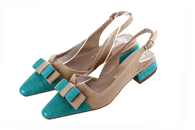 French elegance and refinement for these turquoise blue and tan beige dress slingback shoes, with a knot, 
                available in many subtle leather and colour combinations. The pretty French spirit of this beautiful pump will accompany your steps nicely and comfortably.
To be personalized or not, with your materials and colors.  
                Matching clutches for parties, ceremonies and weddings.   
                You can customize these shoes to perfectly match your tastes or needs, and have a unique model.  
                Choice of leathers, colours, knots and heels. 
                Wide range of materials and shades carefully chosen.  
                Rich collection of flat, low, mid and high heels.  
                Small and large shoe sizes